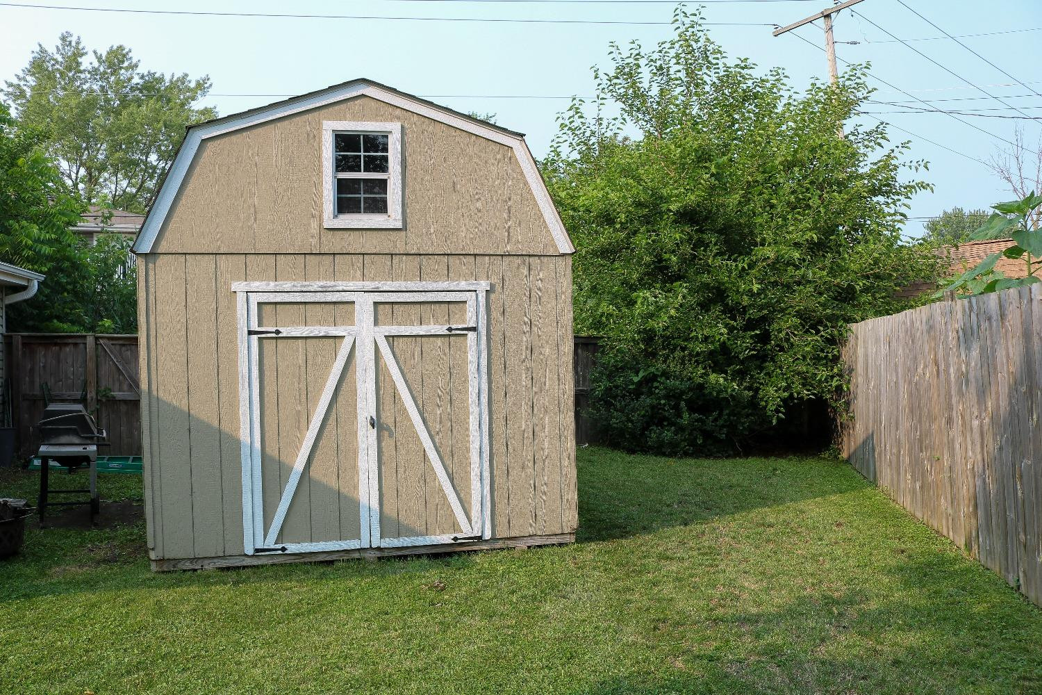 8469 Morse Court Crown Point, IN 46307 - Photo 29 of 33 a view of backyard with small cabin