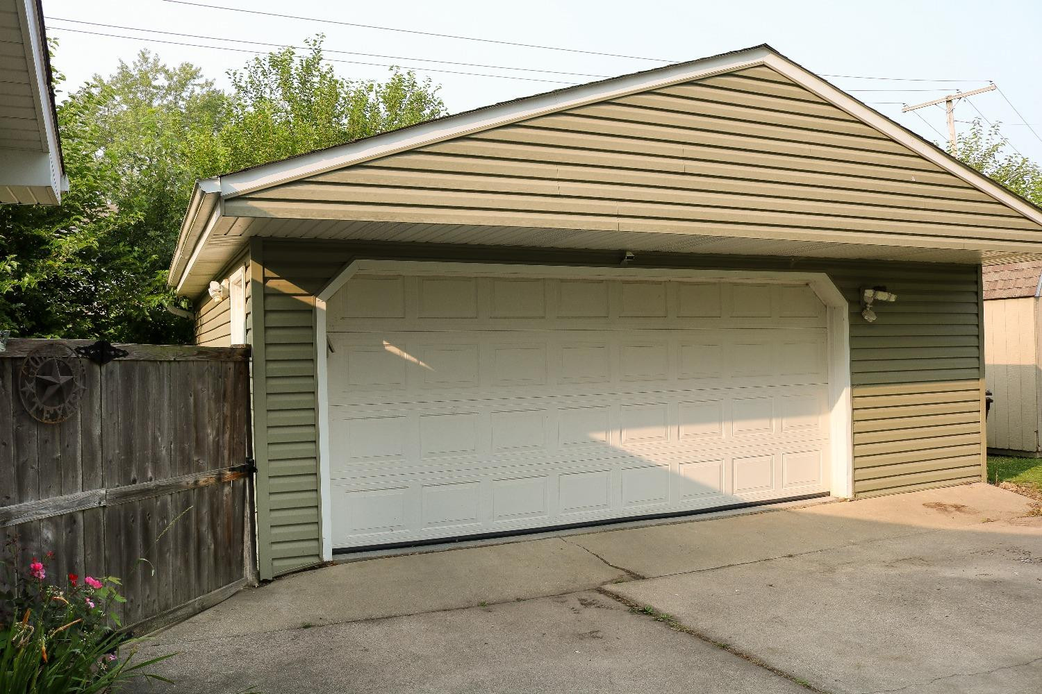 8469 Morse Court Crown Point, IN 46307 - Photo 30 of 33 a view of house with a garage