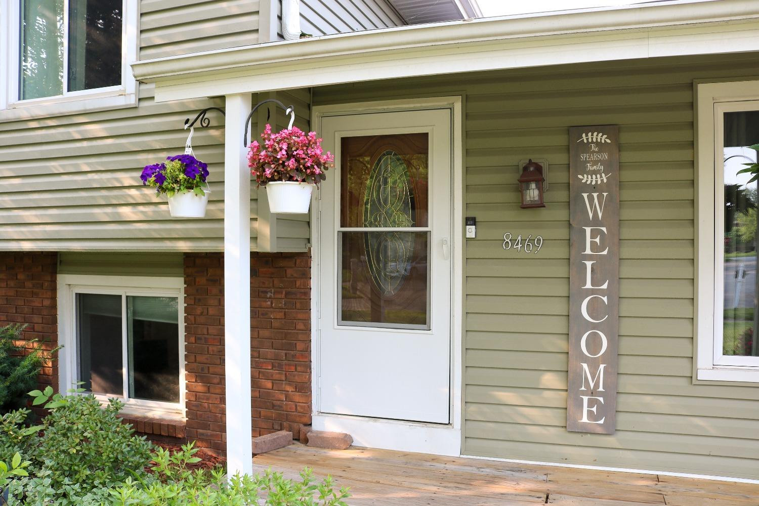 8469 Morse Court Crown Point, IN 46307 - Photo 3 of 33 a front view of a house with an outdoor space
