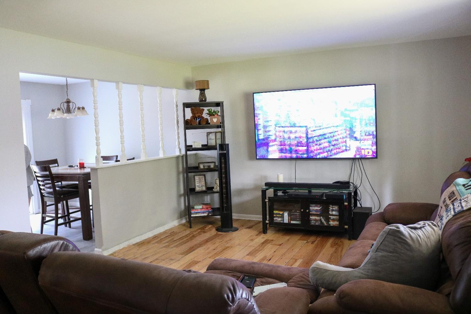8469 Morse Court Crown Point, IN 46307 - Photo 5 of 33 a living room with furniture and a flat screen tv