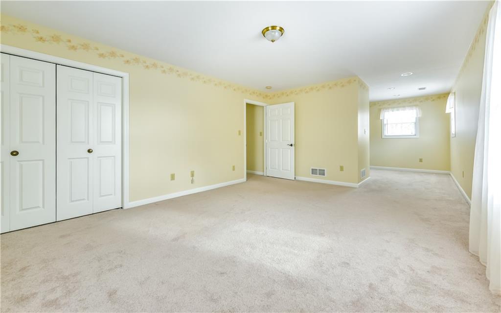 676 Deer Creek Road Valencia, PA 16059 - Photo 17 of 25 Bedroom #2 Upstairs features a sitting area in background which could be used as nursery or guest suite.