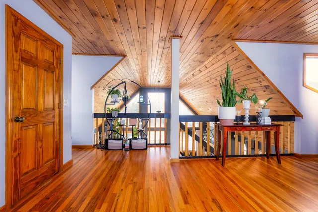 a view of entryway with wooden floor