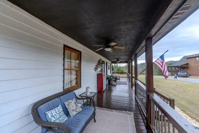 a view of a porch with furniture