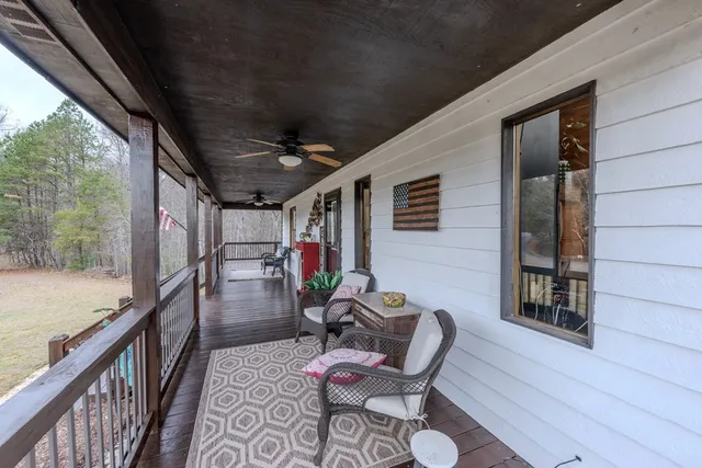 a view of a porch with furniture