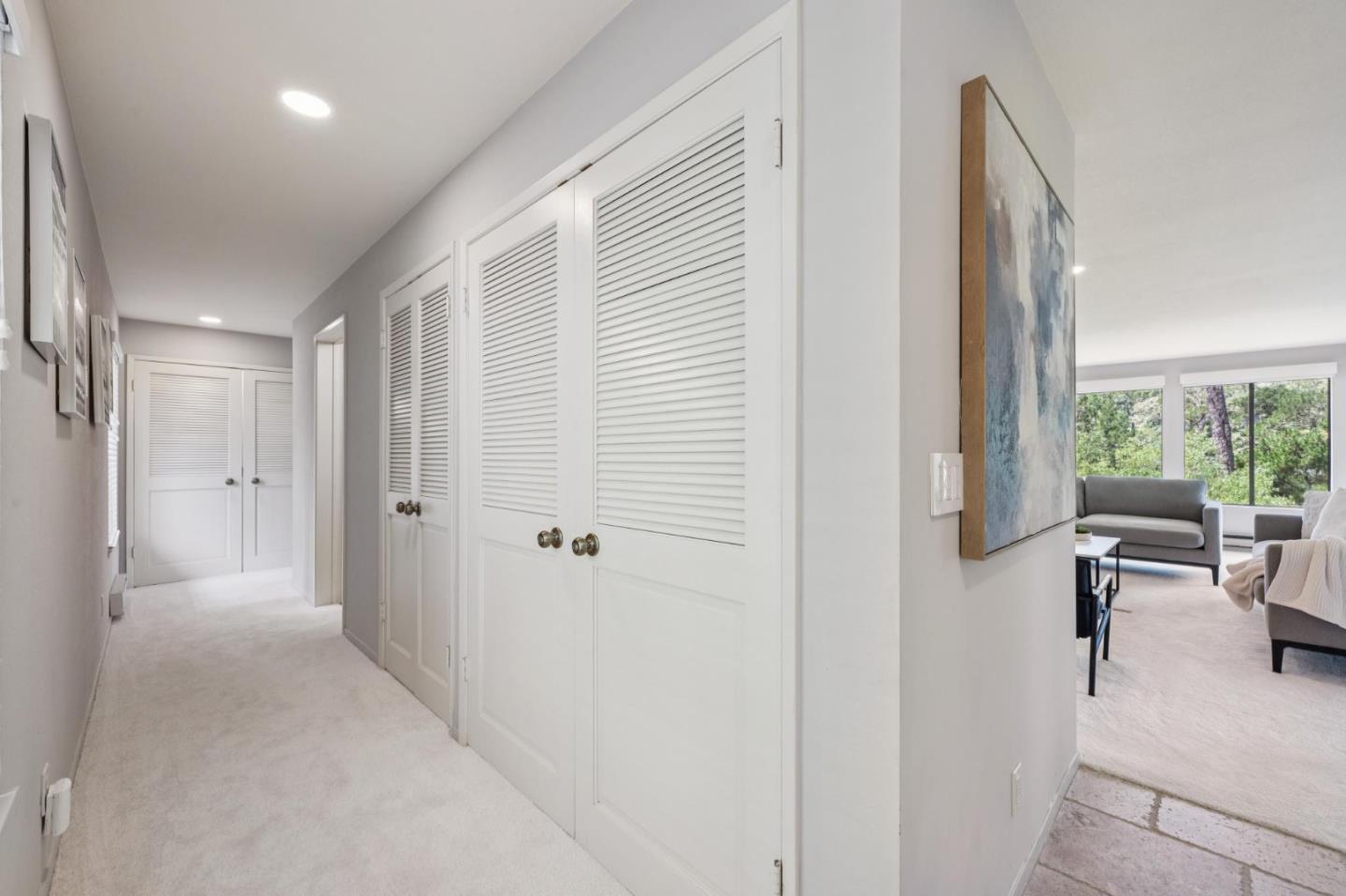 8 Shepherds Knoll Pebble Beach, CA 93953 - Photo 18 of 47 a view of a hallway with furniture and windows
