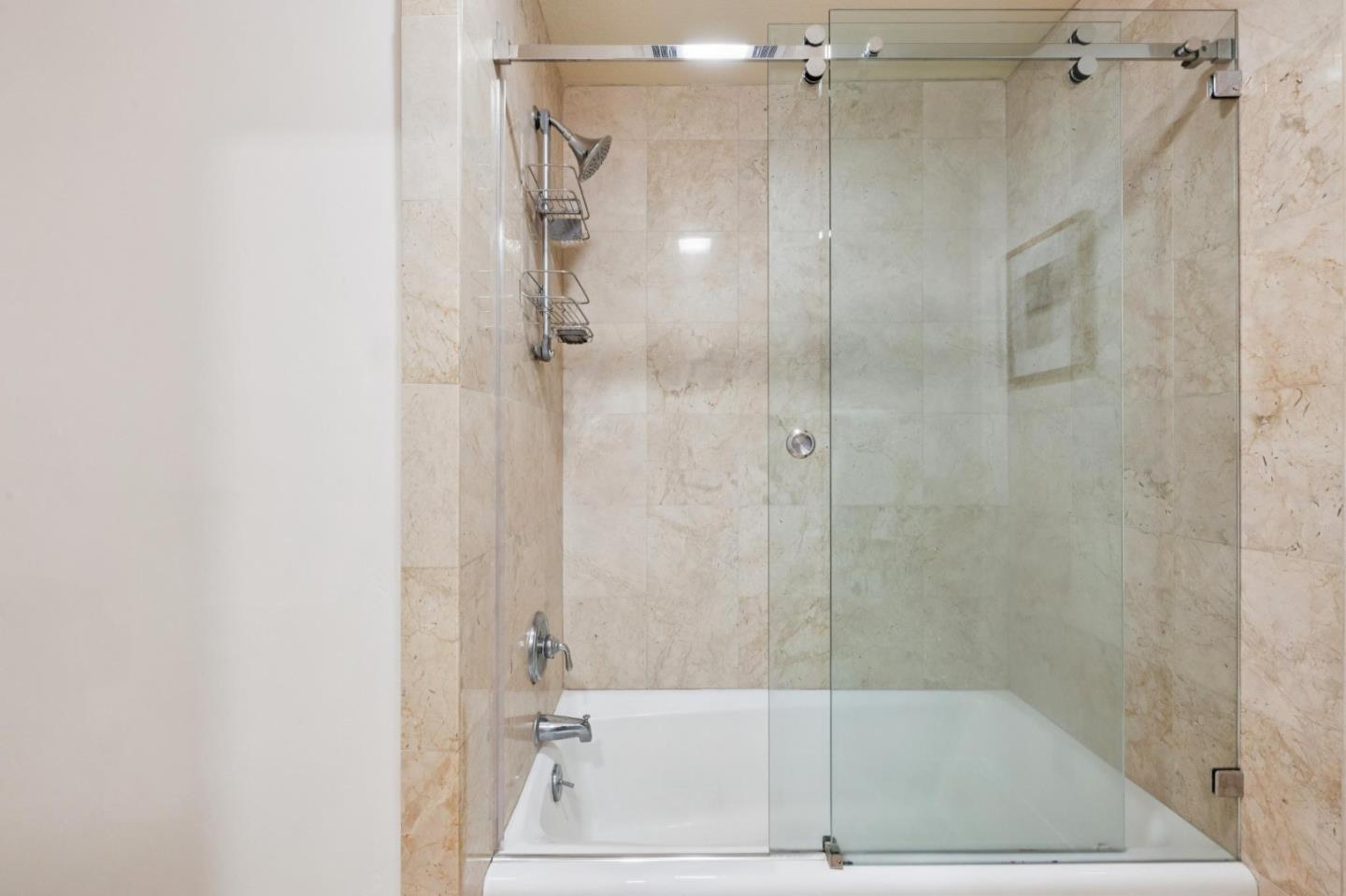 8 Shepherds Knoll Pebble Beach, CA 93953 - Photo 25 of 47 a bathroom with a shower and a bathtub