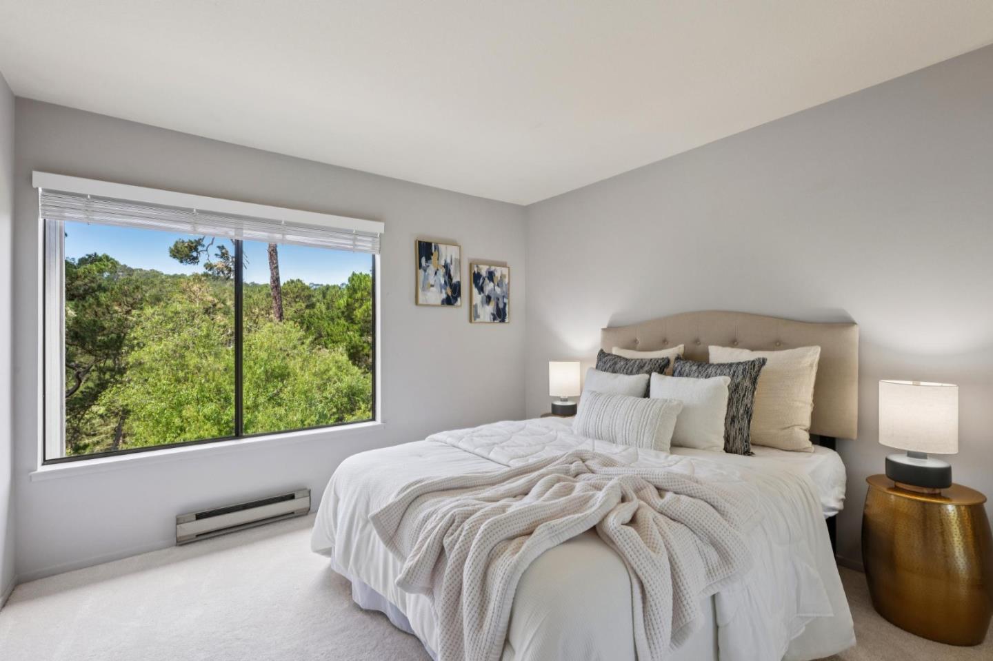 8 Shepherds Knoll Pebble Beach, CA 93953 - Photo 27 of 47 a bedroom with a bed and a large window