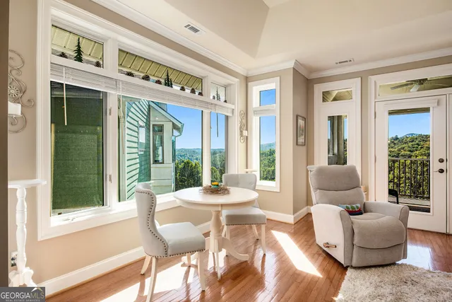 a living room with furniture or outdoor space and a large window