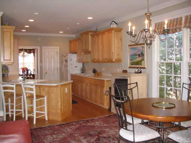 3325 Tall Tree Place Raleigh, NC 27607 - Photo 5 of 10 Bright and open kitchen with generous counter top working space and delightful sunny breakfast room. Other