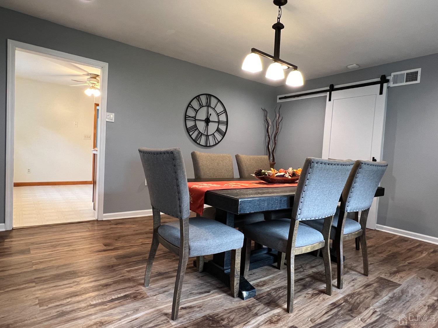 4 Crescent Road Edison, NJ 08817 - Photo 12 of 24 a view of a dining room with furniture window and wooden floor