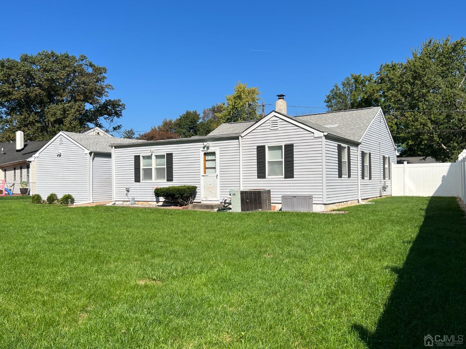 4 Crescent Road Edison, NJ 08817 - Photo 23 of 24 a view of a house with a backyard