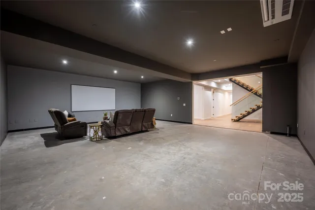 a kitchen with white cabinets and appliances