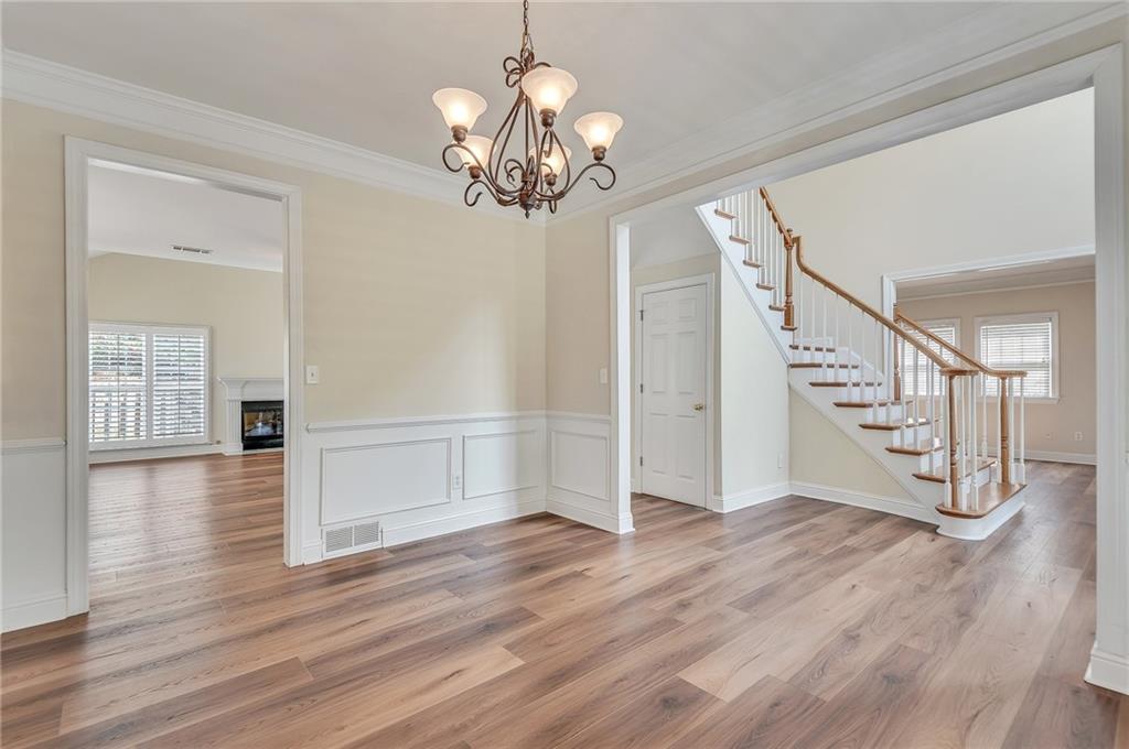 4115 Montvale Crossing Cumming, GA 30041 - Photo 12 of 38 a view of entryway with wooden floor
