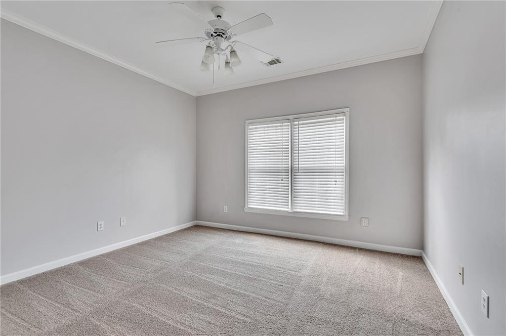 4115 Montvale Crossing Cumming, GA 30041 - Photo 32 of 38 an empty room with a window