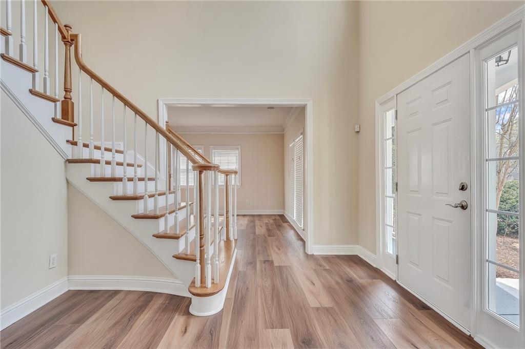 4115 Montvale Crossing Cumming, GA 30041 - Photo 7 of 38 a view of entryway with wooden floor