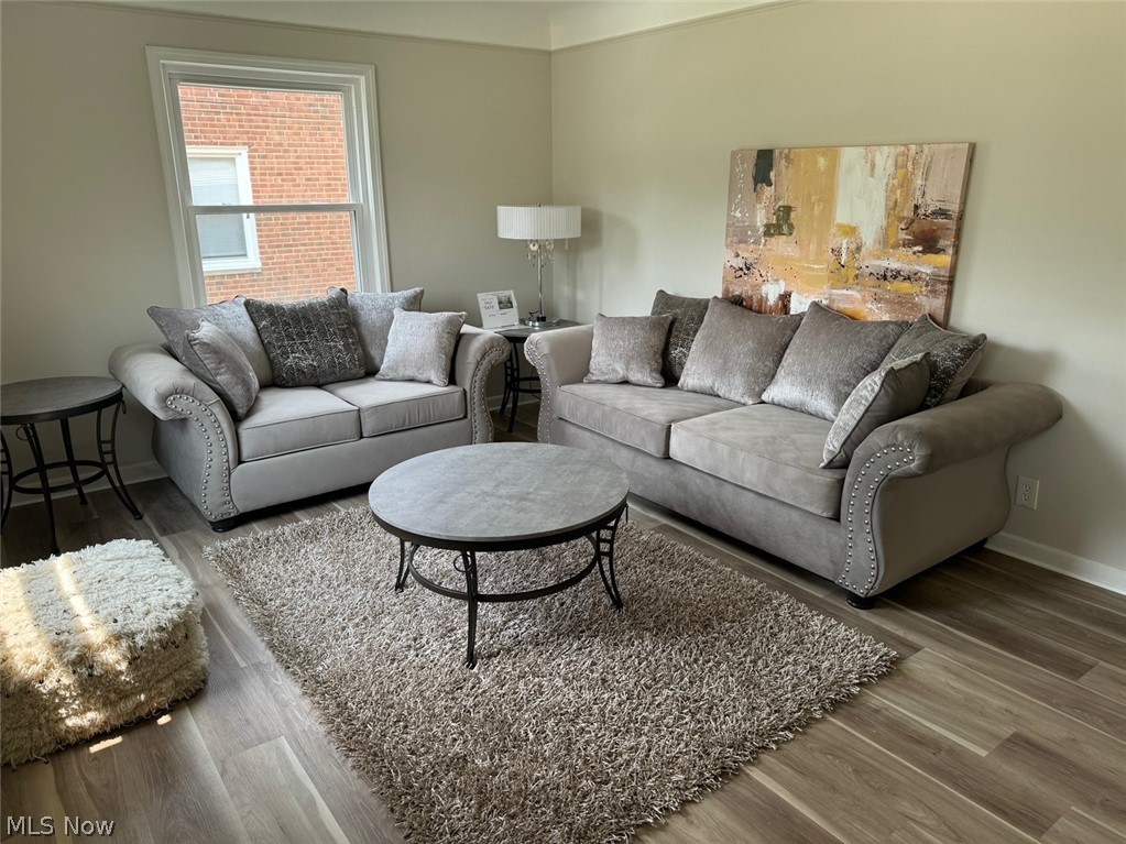 5671 Wellington Road Cleveland, OH 44124 - Photo 3 of 26 Living room featuring hardwood / wood-style flooring