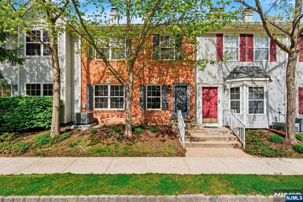 2063 Drake Court Mahwah, NJ 07430 - Photo 1 of 25 a front view of a house with a yard