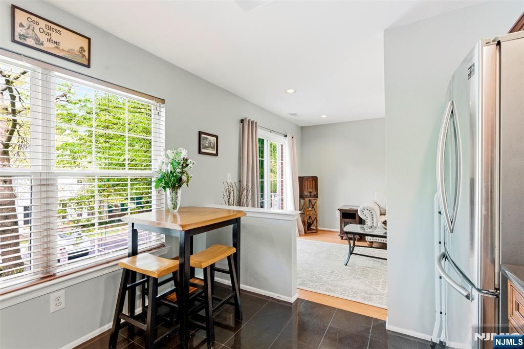 2063 Drake Court Mahwah, NJ 07430 - Photo 13 of 25 a dining room with furniture and a window