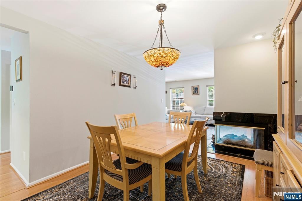 2063 Drake Court Mahwah, NJ 07430 - Photo 6 of 25 a view of a dining room with furniture and wooden floor