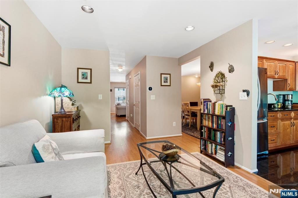 2063 Drake Court Mahwah, NJ 07430 - Photo 9 of 25 a living room with furniture and a book shelf