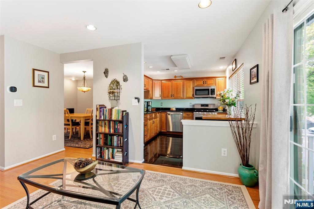 2063 Drake Court Mahwah, NJ 07430 - Photo 10 of 25 a dining room with furniture and wooden floor