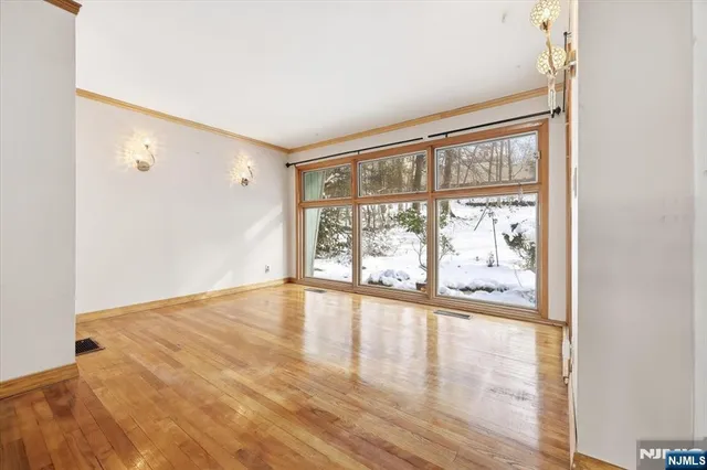 a kitchen with a sink stainless steel appliances and cabinets