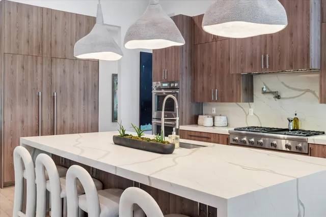 a view of a chair and fire pit in the garden