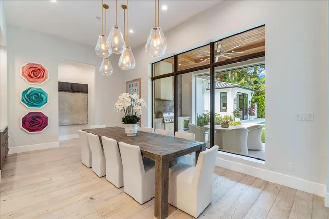 a kitchen with a refrigerator and a sink