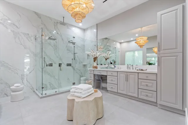 a view of a porch with furniture and garden