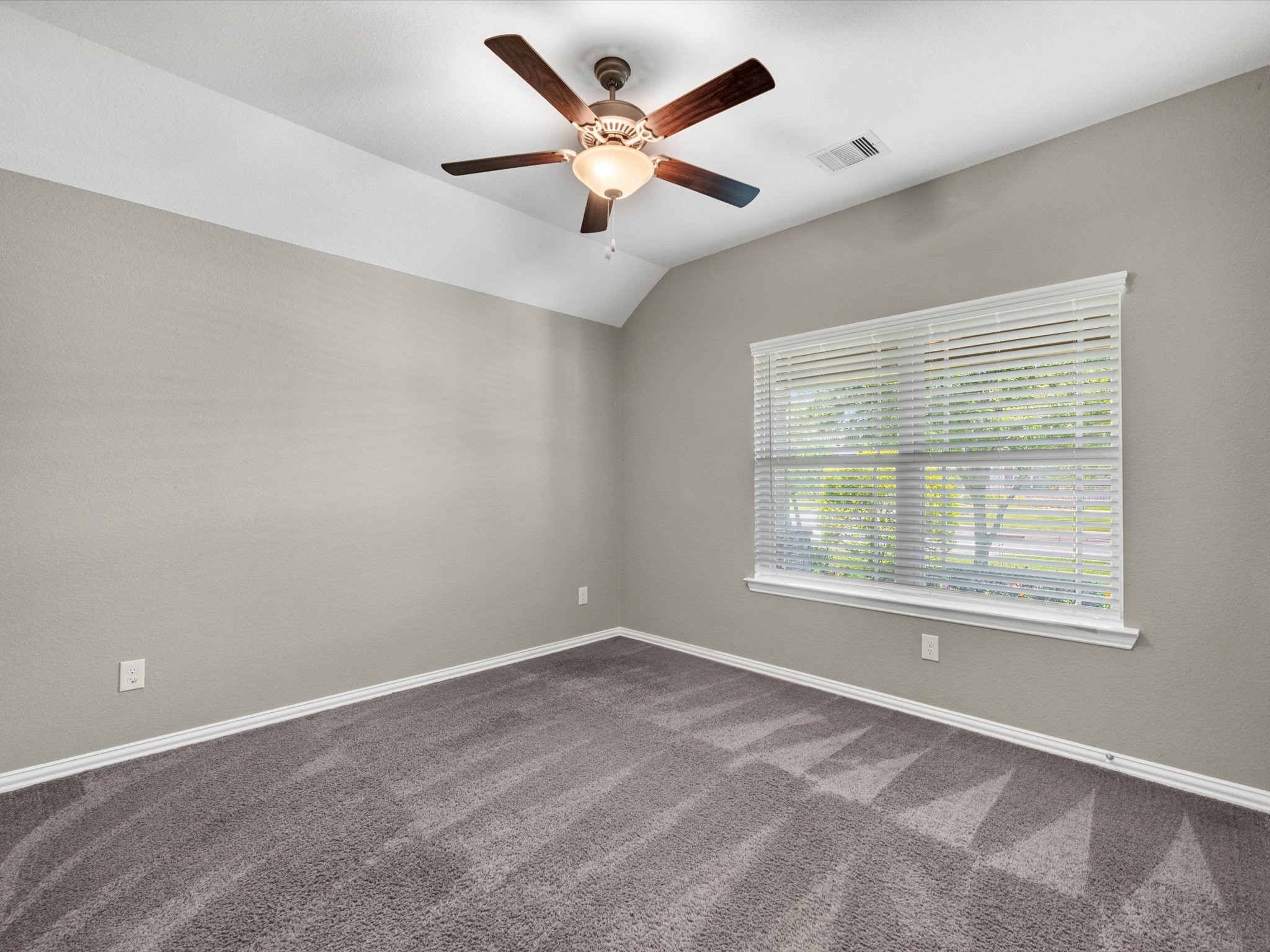 31120 Aspen Gate Trail Spring, TX 77386 - Photo 18 of 33 an empty room with ceiling fan and windows