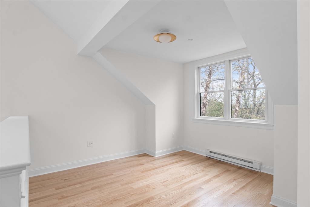 10 Deer Path Lane, Unit 10 Reading, MA 01867 - Photo 17 of 23 an empty room with windows