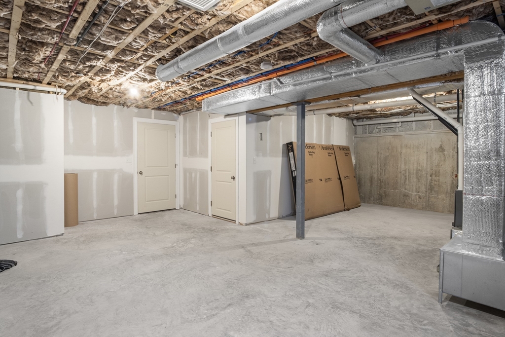 10 Deer Path Lane, Unit 10 Reading, MA 01867 - Photo 20 of 23 a view of an empty room