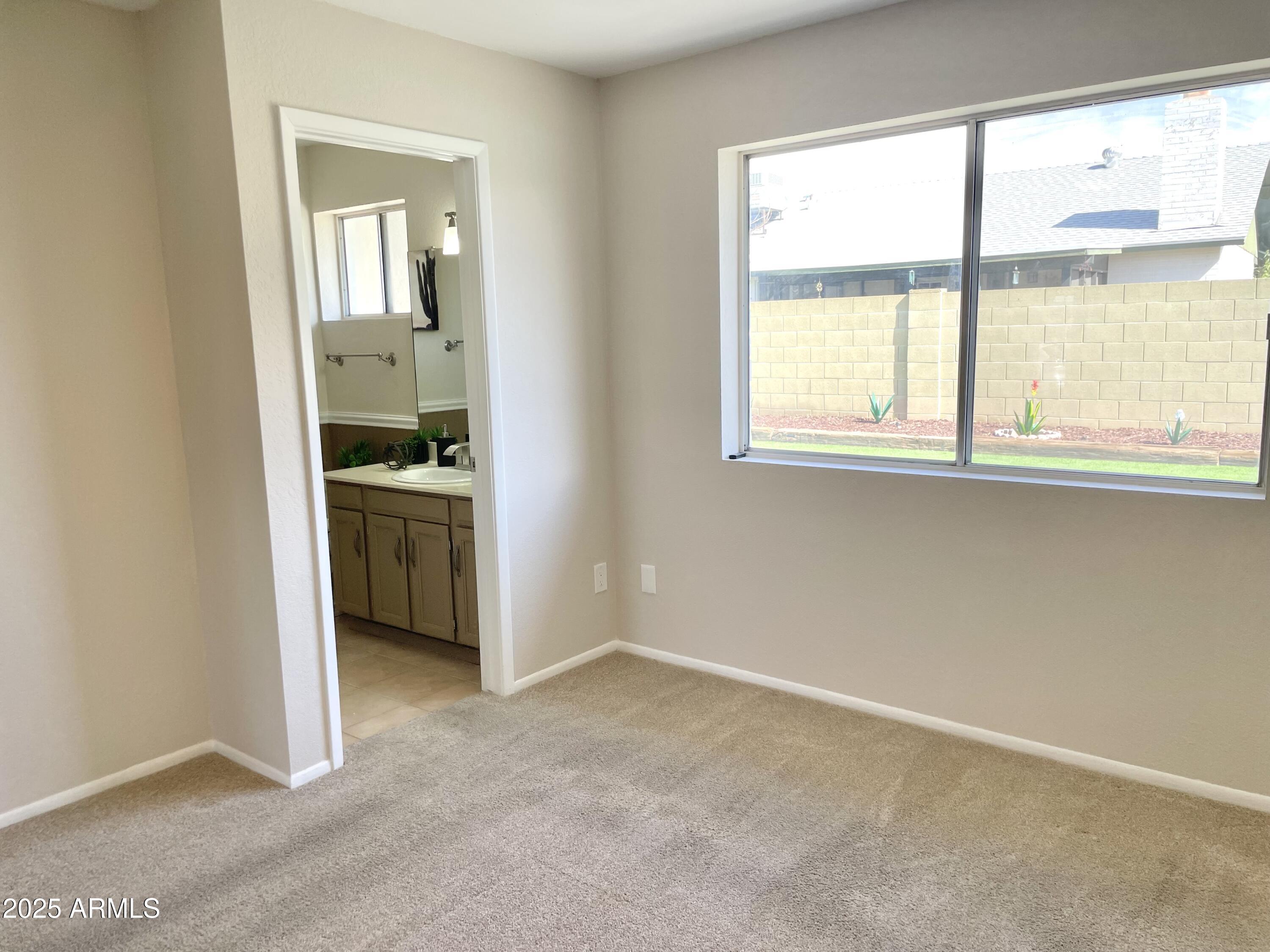 4038 West Windrose Drive Phoenix, AZ 85029 - Photo 30 of 43 Master bed to Master bathroom