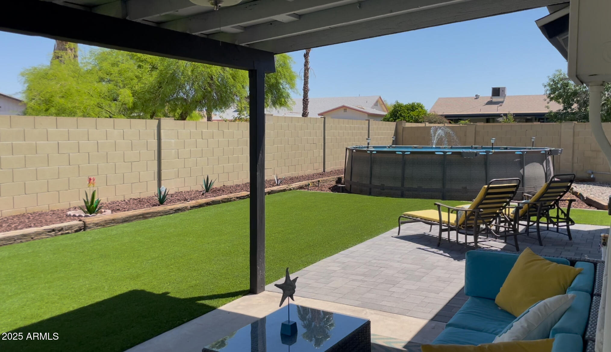4038 West Windrose Drive Phoenix, AZ 85029 - Photo 34 of 43 swimming pool view with a seating space