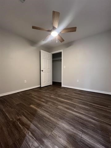 10516 Peck Road Lumberton, TX 77657 - Photo 25 of 27 a view of an empty room with wooden floor and a ceiling fan
