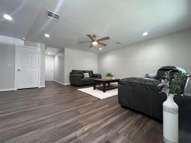 10516 Peck Road Lumberton, TX 77657 - Photo 3 of 27 a living room with furniture and wooden floor