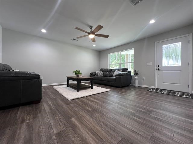 10516 Peck Road Lumberton, TX 77657 - Photo 4 of 27 a living room with furniture and wooden floor