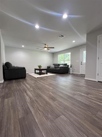 10516 Peck Road Lumberton, TX 77657 - Photo 5 of 27 a living room with furniture and a wooden floor