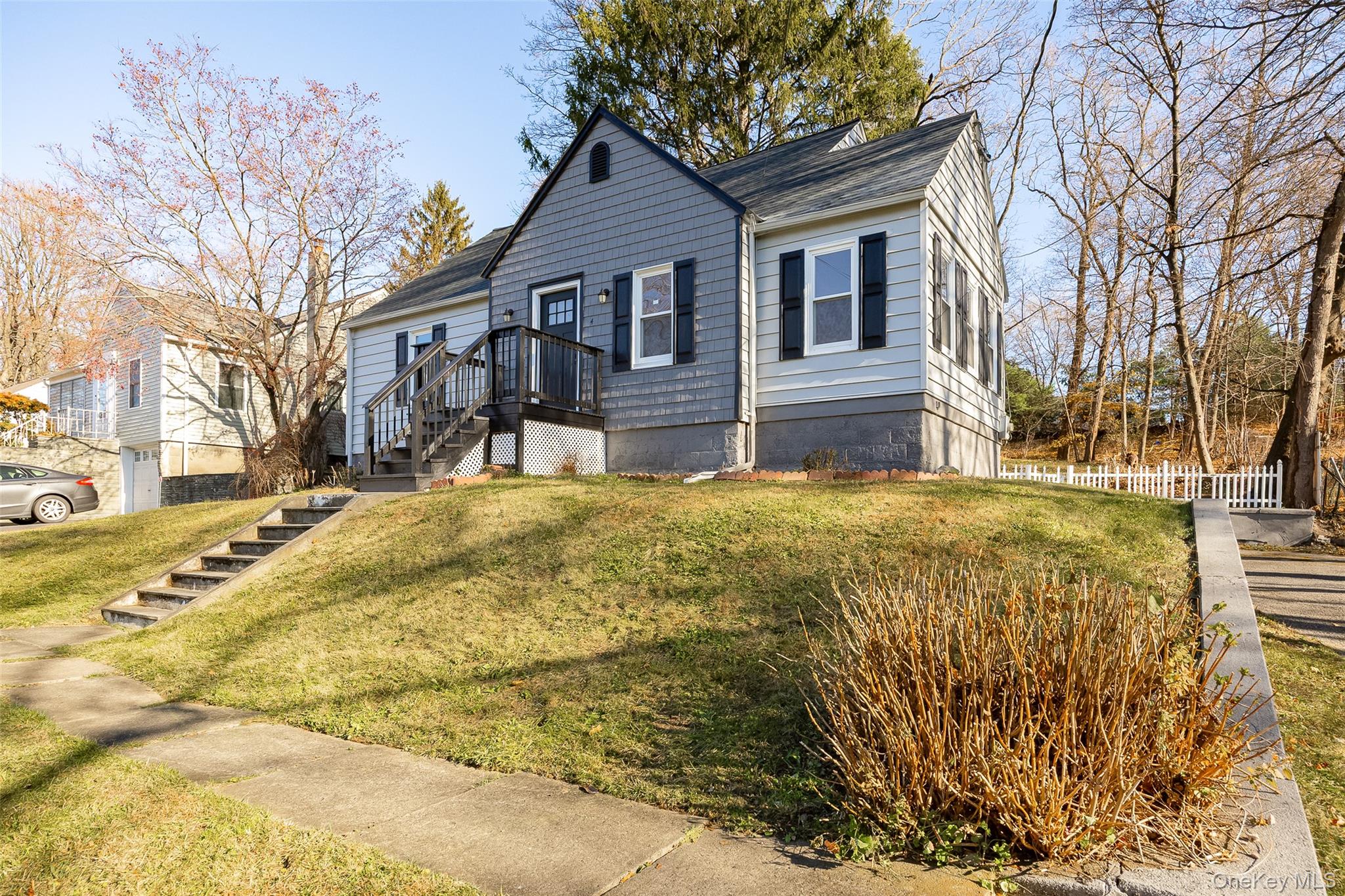 4 Walnut Street Poughkeepsie, NY 12601 - Photo 25 of 26 a view of a house with snow on the side of the road