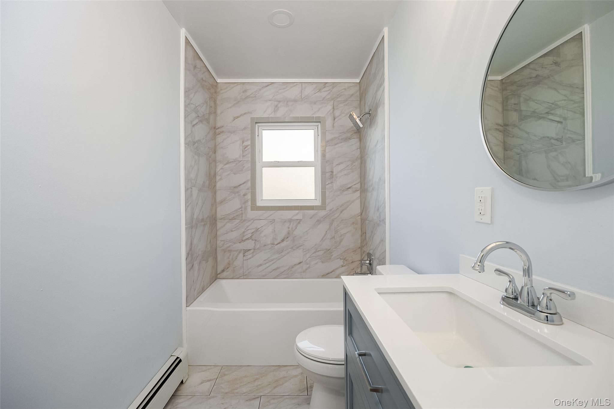 4 Walnut Street Poughkeepsie, NY 12601 - Photo 8 of 26 a bathroom with a sink toilet and bathtub