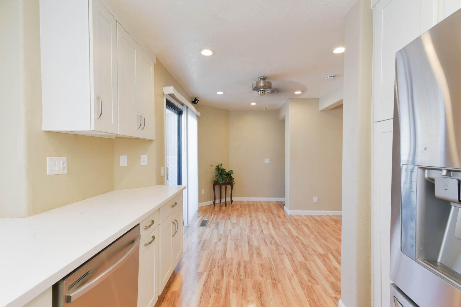 278 South Seneca Circle, Unit 47 Anaheim, CA 92805 - Photo 12 of 29 a view of a kitchen with a sink and a refrigerator