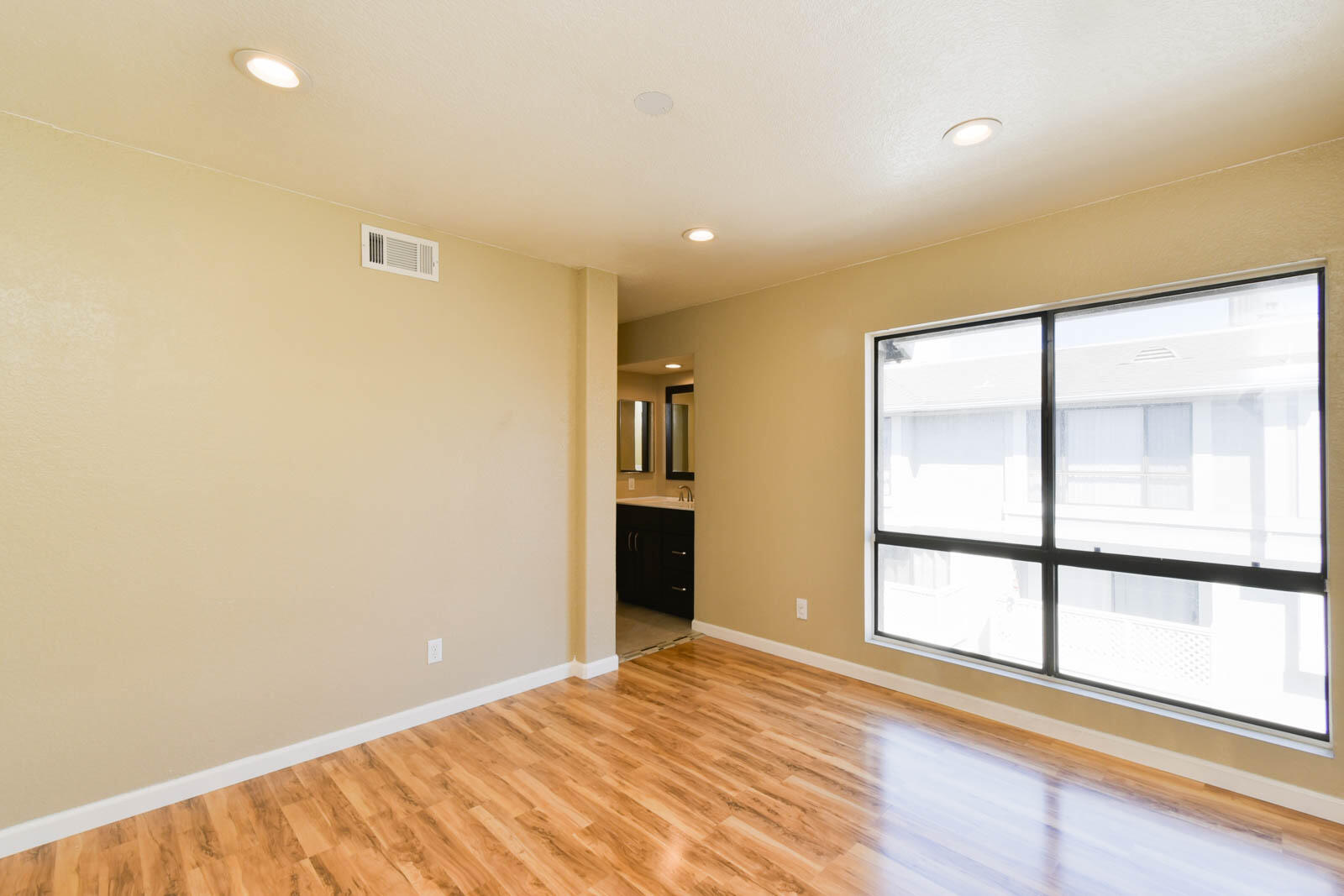 278 South Seneca Circle, Unit 47 Anaheim, CA 92805 - Photo 20 of 29 a view of an empty room with a window