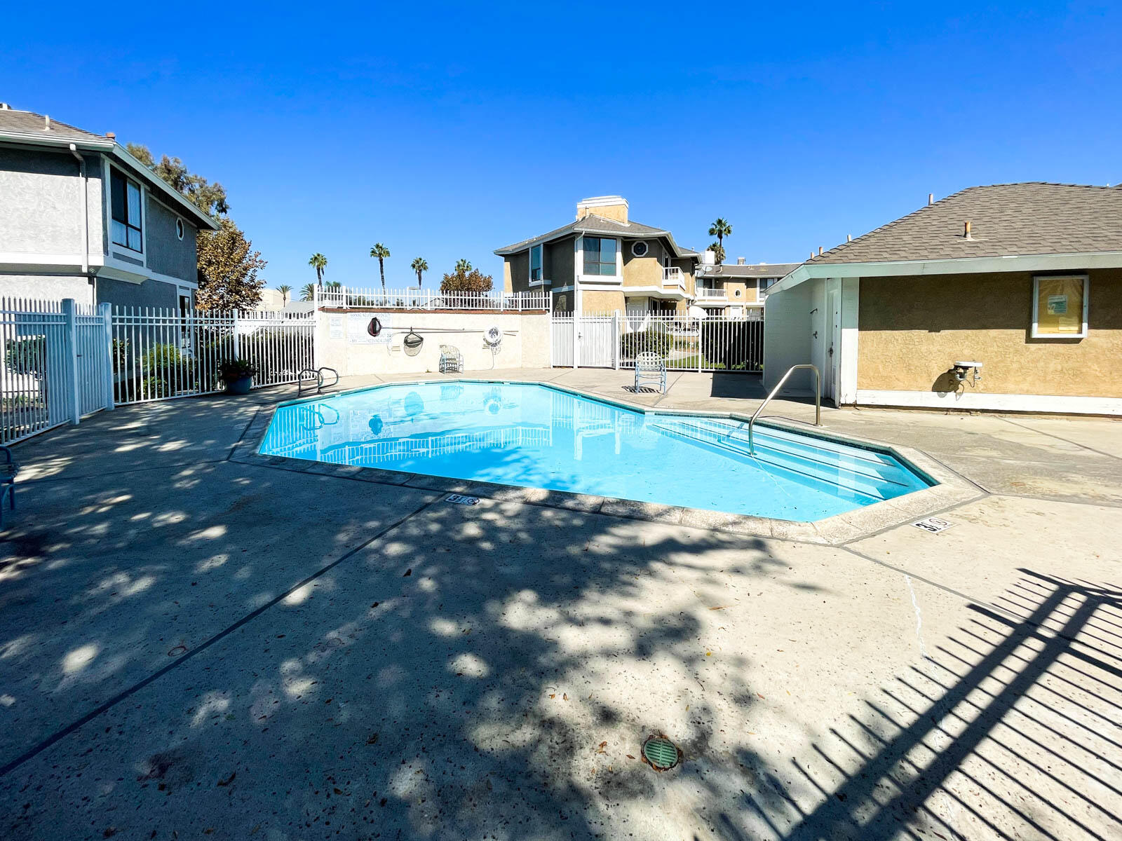 278 South Seneca Circle, Unit 47 Anaheim, CA 92805 - Photo 27 of 29 a view of a house with swimming pool