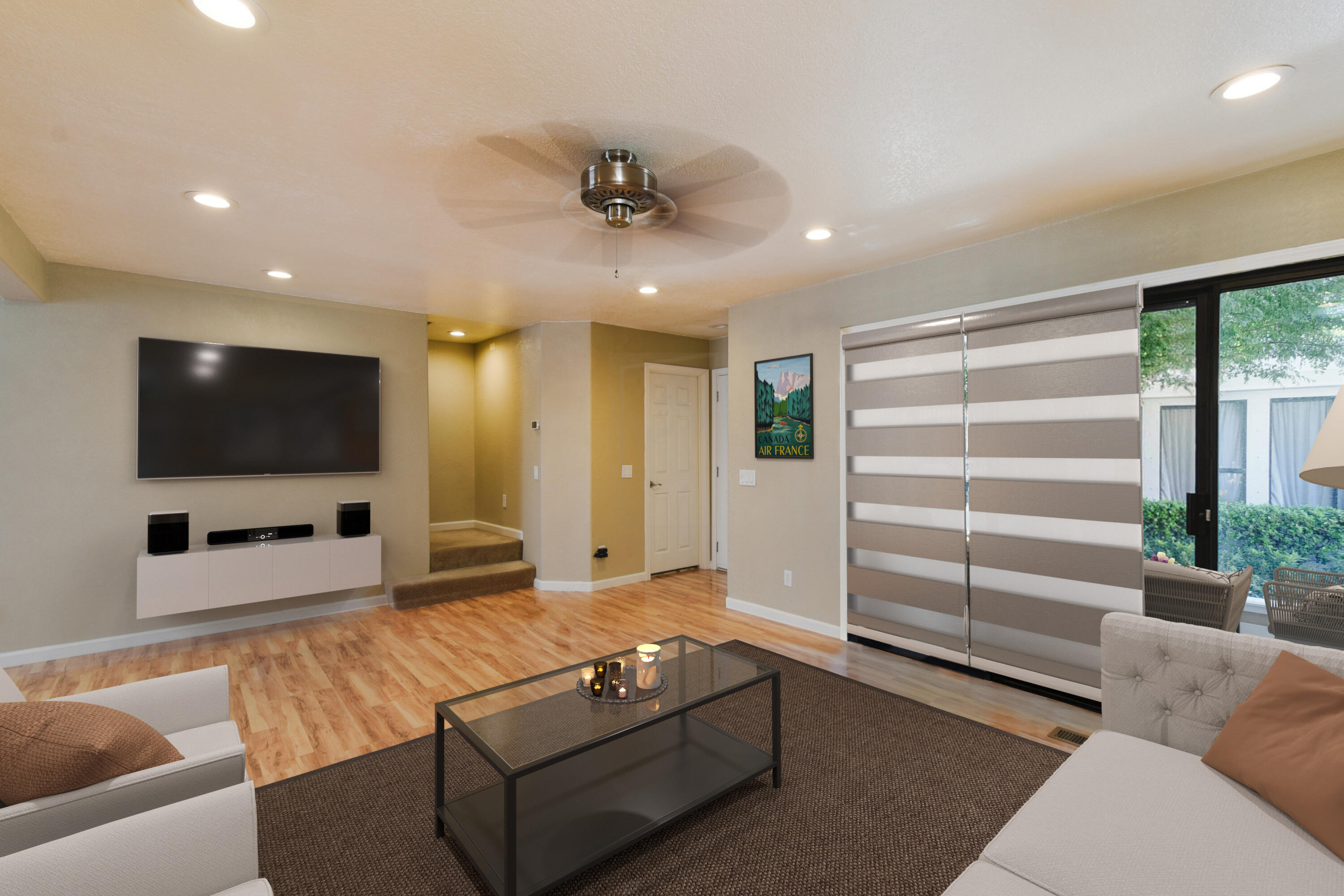 278 South Seneca Circle, Unit 47 Anaheim, CA 92805 - Photo 3 of 29 a living room with furniture and a flat screen tv
