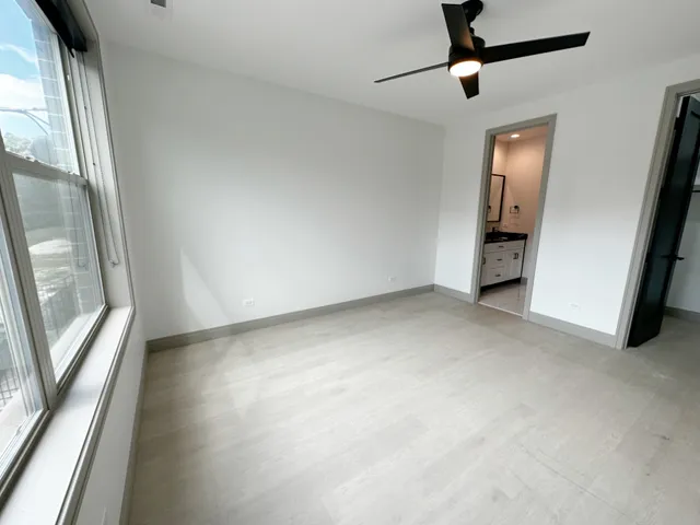 a view of an empty walk in closet