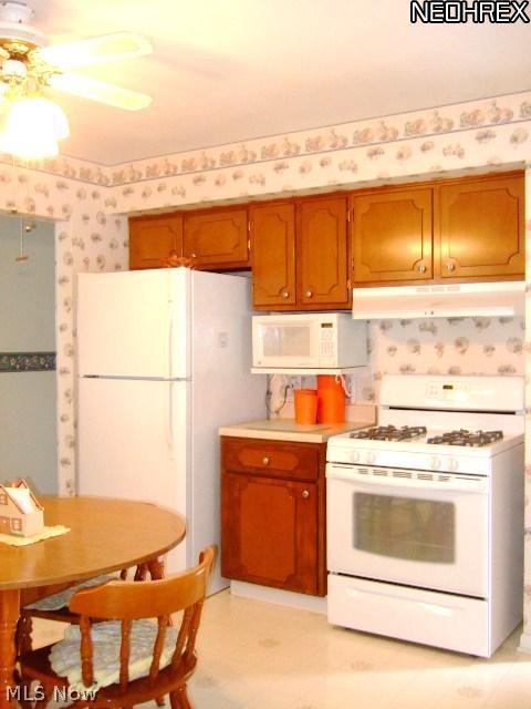 13634 Carpenter Road Garfield Heights, OH 44125 - Photo 9 of 24 All the appliances will stay! The stove is approx 5 yrs old. More cabinets!
