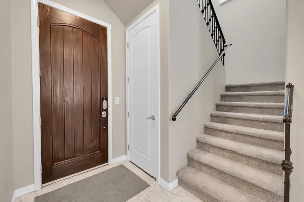 a view of staircase with white walls and white walls