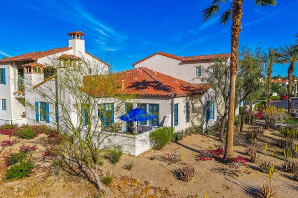 a view of a house with a snow in the yard