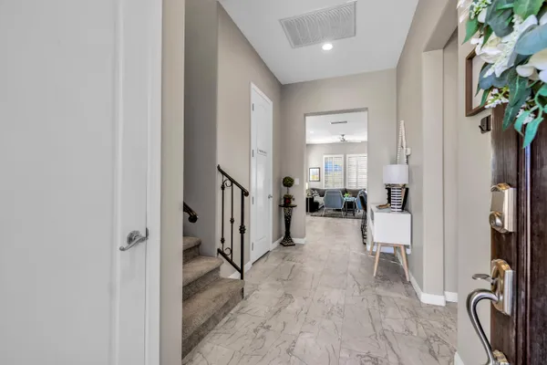 a view of entryway with livingroom and furniture