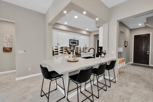 a view of a dining room with furniture